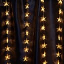 Светодиодная гирлянда Feron CL25 занавес Звездочки 21м 3м 230V 2700K статичная c питанием от сети прозрачный шнур 48607