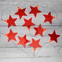 Гирлянда светодиодная Звездопад красная 10 LED 225 м прозрачный ПВХ теплый белый свет свечения 2 х АА батарейки не в комплекте NEONNIGHT 304002