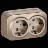 GLORY Розетка 2-местная для открытой установки с заземлением с защитными шторками 16А РСш22-3-ХШм шампань матовый IEK