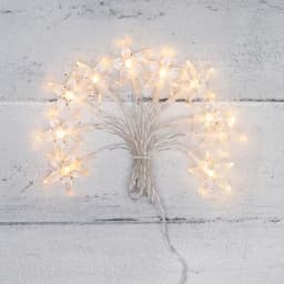 Гирлянда светодиодная Звездочки 15 м 10 LED прозрачный ПВХ цвет свечения теплый белый 2 х АА батарейки не в комплекте NEONNIGHT 303091