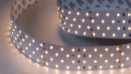 Светодиодная лента LUX 2835 280 LEDм 26 Втм 24В IP33 3000K DSG228024WW33